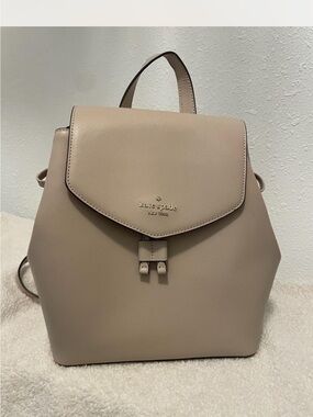 kate spade beige leather flap backpack